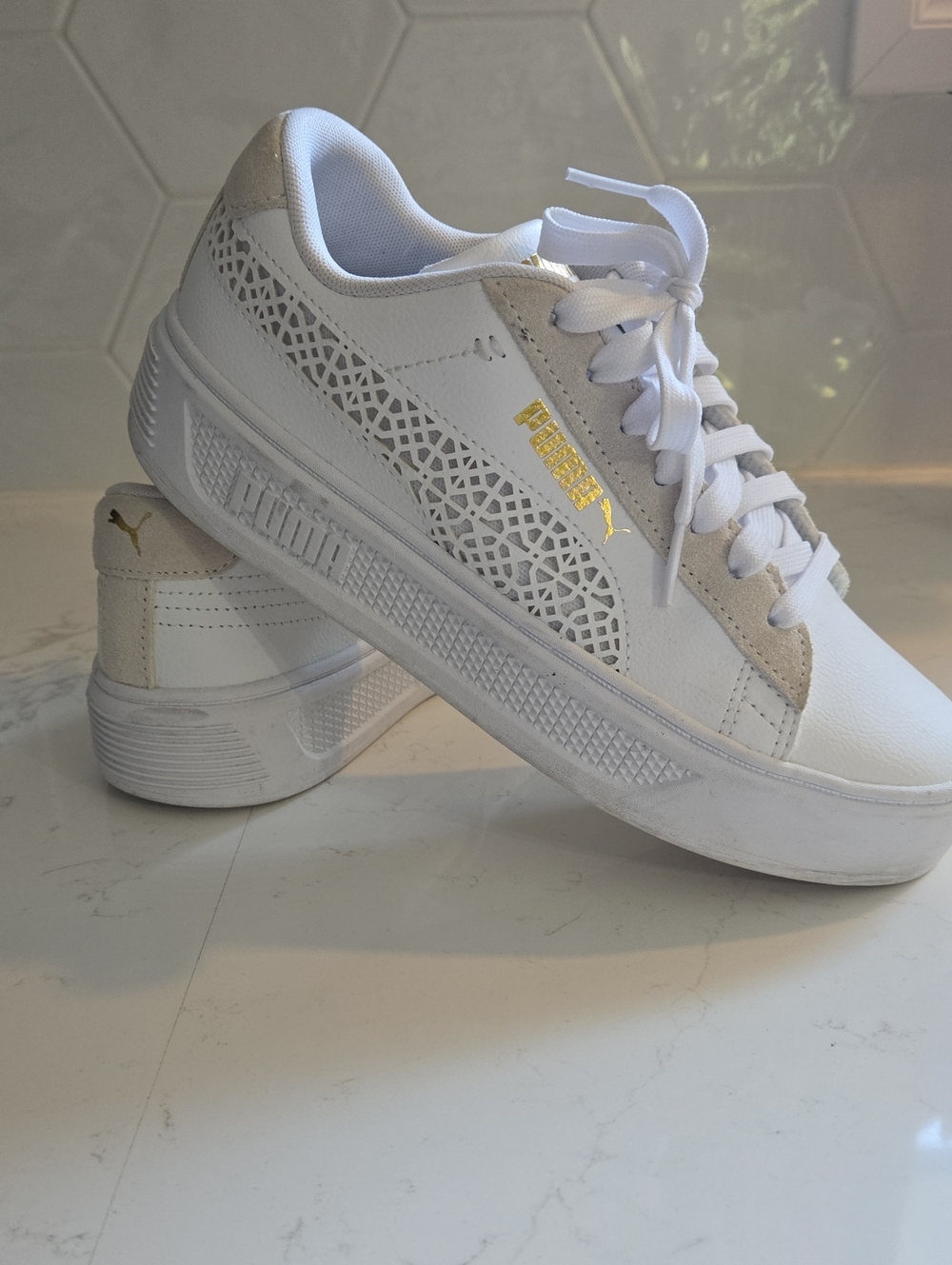 Puma White Low-Top Sneakers with Gold Logo